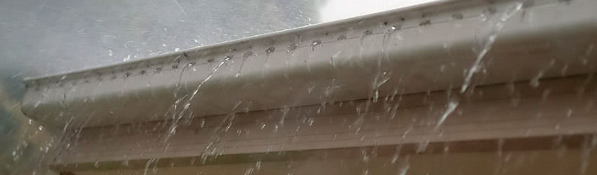Raiinwater Pouring From Rooftop