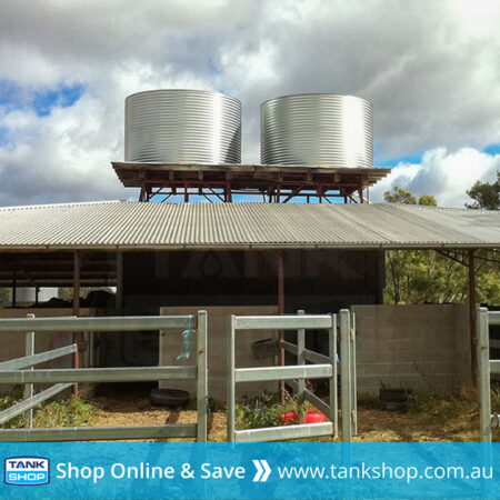 Gravity fed rainwater - Round steel water tanks on tank stand
