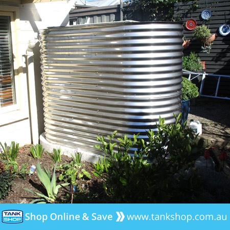 Stainless Steel Slimline Rain Water Tank in the Garden